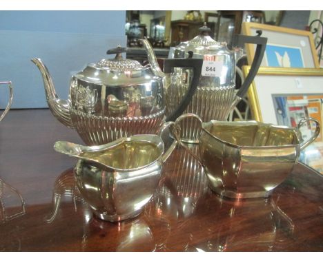 A FOUR PIECE SILVER PLATED TEA AND COFFEE SERVICE