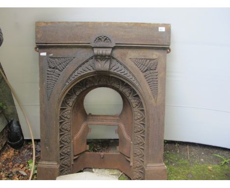 A VICTORIAN CAST IRON FIREPLACE the rectangular shelf above a moulded frieze with fern decoration and arched inset 104cm (h) 