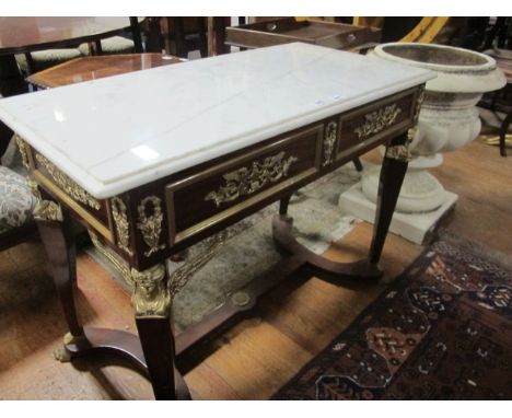 A CONTINENTAL WALNUT AND GILT BRASS MOUNTED SIDE TABLE surmounted with a white vein marble top raised on square tapering legs