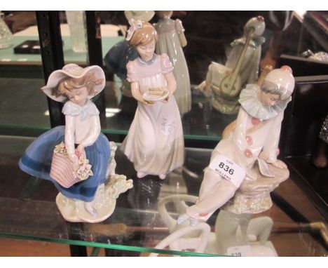 THREE CHINA FIGURES to include lladro and nao