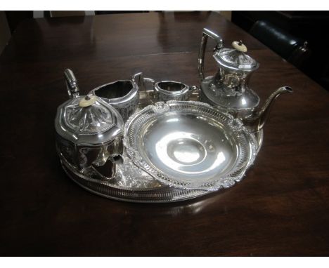 A FOUR PIECE PLATED ENGRAVED TEA AND COFFEE SERVICE together with an oval plated tray and comport (6)