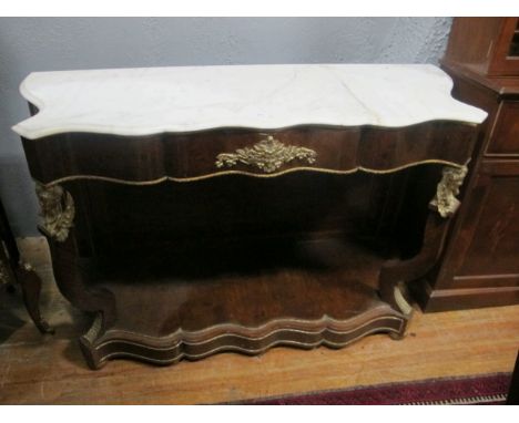 A FINE CONTINENTAL WALNUT GILT BRASS MOUNTED CONSOLE TABLE the white vein marble top above a frieze drawer on front scroll su