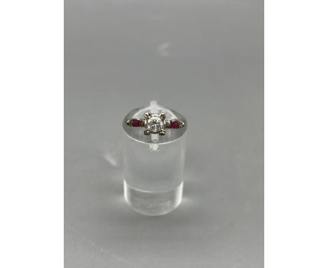 0.25ct Dimond and Ruby 18ct White Gold Engagement Ring. 