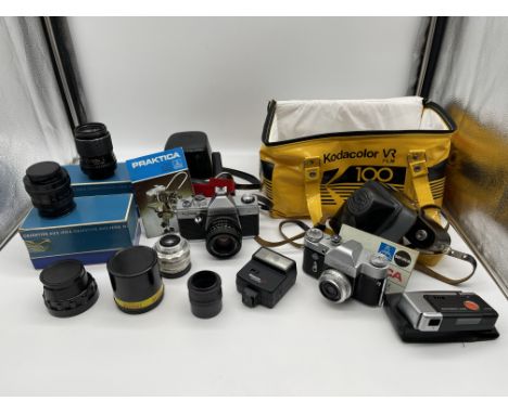Praktica Super TL1000 Vintage Camera, Zenit 3m Vintage Camera along with lenses and other equipment. 