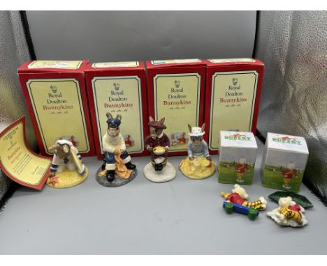 Four Boxed Royal Doulton Bunnykins Figurines, along with Two Boxed R&amp;R Hill Rupert Magnetic Figures. 
Good condition, no 