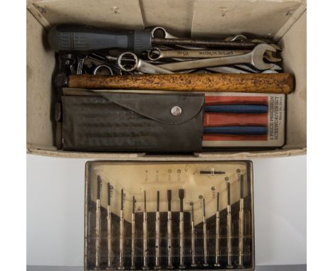 Box containing model knife, net and miscellaneous hand tools.