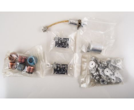 Box containing four engine timers and miscellaneous engine spares.