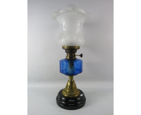 Vintage oil lamp with blue glass reserve and etched glass shade, 22" tall.