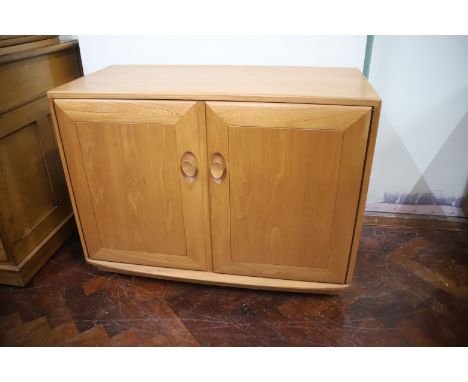 Modern Ercol Cupboard unit with double doors to front. H:27 x W:36 x D:18 inches. Very good condition. See photos. 