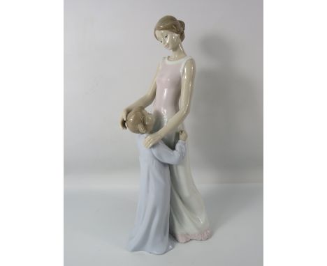 Tall Lladro Figurine of a mother and child called " Someone to Look up to". 14" tall.