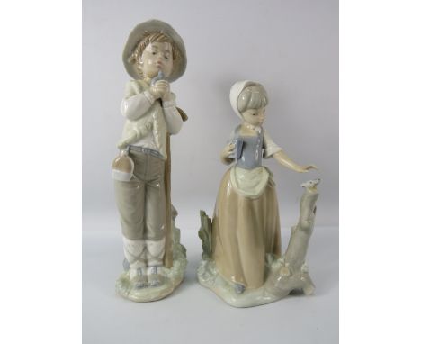Two Nao Figurines, the tallest is 11 1/4" (boy has a repair to neck).