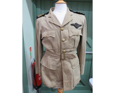 1930's Indian Airforce Officers Pilots Tunic with Winged insignia and Captains Epaulettes to shoulders (spares in breast pock