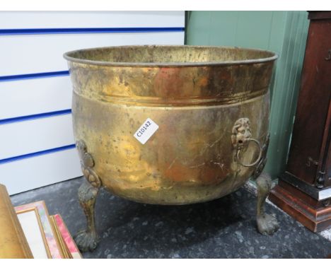 Large brass Stick Tub with Lion Paw feet, Lion head Handles. Measures approx 14 x 17 inches. See photos.