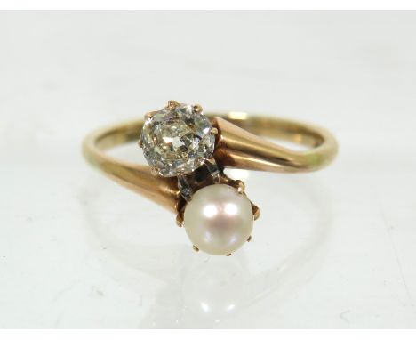 9ct Yellow Gold Ring set with a Pearl and a Brilliant Cut Diamond of approx 0.40pts.  Finger size P.  Total Weight 2.5g