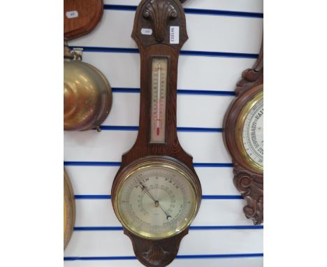 English Made Barometer/Thermometer on Oak Base. Measures approx 30 x 10 inches. See photos. 