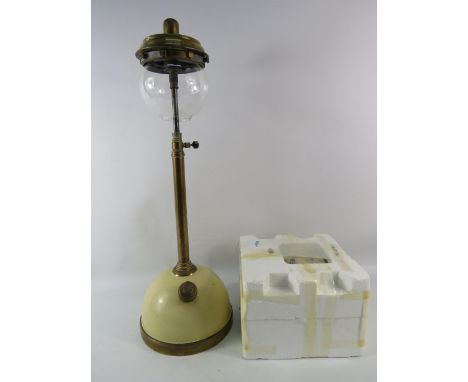 A Mid 20thC Table model tilley lamp with spare glass globe, 21" tall.
