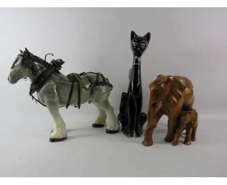 Mixed lot to include a Large retro cat vase, wooden elephants and a large ceramic grey shire horse.