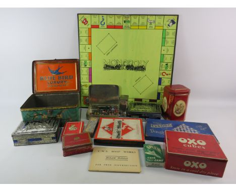 Selection of vintage tins and games.