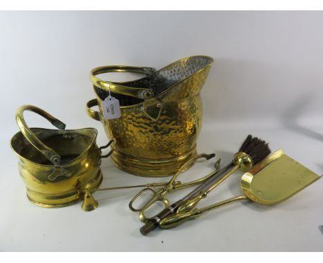 Two brass Helmet coal buckets and various fire side tools.