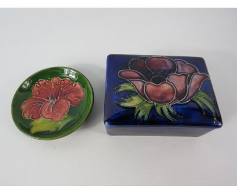 Moorcroft Anemone lidded trinket (3.5" long, 1.5" high & 2 3/4" deep) plus a Hibiscus pin dish 3" diameter.