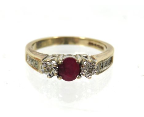9ct Yellow Gold ring set with a central Ruby and flanked by two Illusion set Melee Diamonds.  Finger size 'M-5'   3.0g