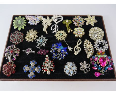 Large selection of good quality vintage and modern brooches.
