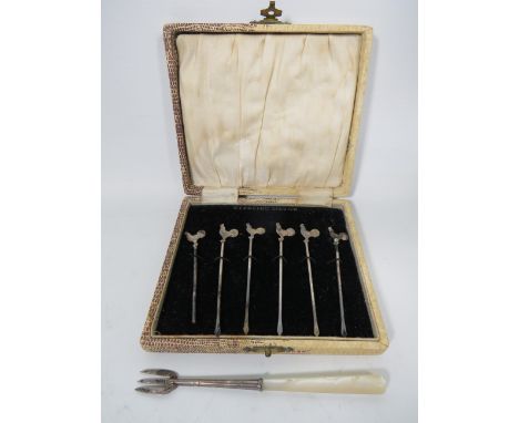 Set of Vintage Sterling Silver cocktail swords with Rooster to top. All boxed. Together with a MOP Silver Pickle fork see pho