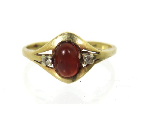 14ct Yellow Gold ring set with a central Cornelian with clear gemstones.  Finger size 'O'   2.2g
