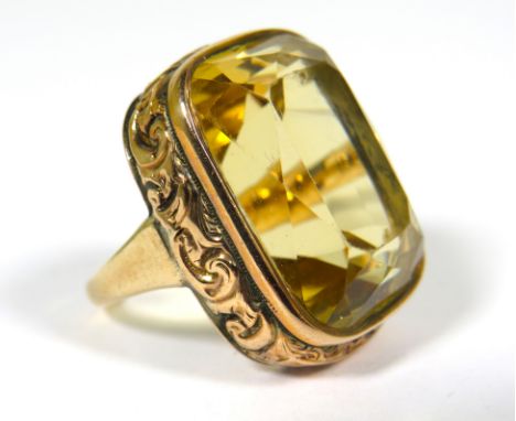 Stunning  Statement ring Set with a large Citrine which measures 22 x 18 mm set in a 9ct Yellow Gold Ring Mount. Finger size 