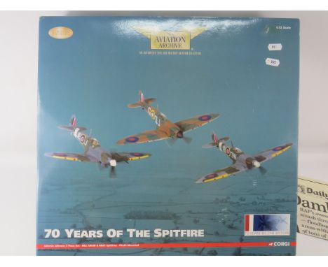 Corgi 1:72 Scale Die Cast Model set of 70 years of the Spitfire collection. Contains three Die cast Spitfires, One has missin