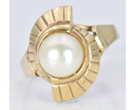 A 9ct gold ring set with a pearl, 5.4g, size P