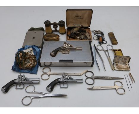 A quantity of small collectables including miniature pistols and revolvers, opera glasses, Joseph Egg box, scissors, brass tr