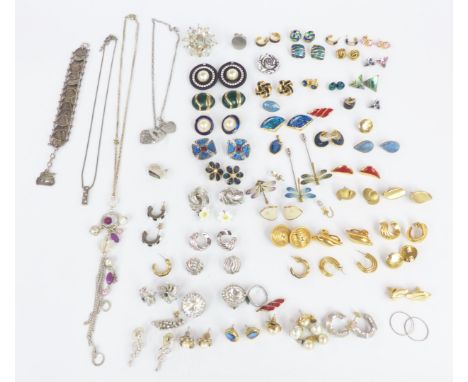 A collection of vintage earrings including Monet, silver, Dorlan, Yves Saint Laurent etc