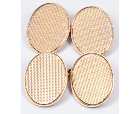 A pair of 9ct rose gold cufflinks with engine turned decoration, 8.7g