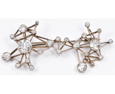 Art Deco/ mid 20thC 18ct white gold pendant/ brooch of angular framework design, set with 25 diamonds the largest approximate