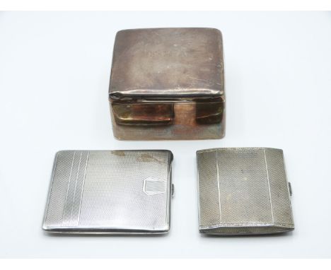 Hallmarked silver cigarette box, Chester, and two hallmarked silver engine turned cigarette cases, both Birmingham and one Ar