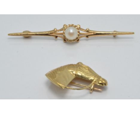 A 9ct gold brooch in the form of a horse's head and a 9ct gold brooch set with a pearl, 2.6g