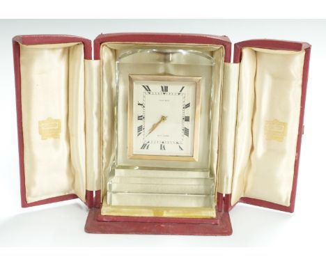 Cartier crystal cased clock with Roman ivory coloured dial, the eight hour keyless movement stamped 4864, in original fitted 