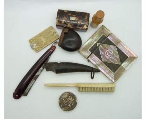 A collection of 19thC bijouterie and treen including an ivory dance card, treen nut snuff box, turned boxwood vessel with gla