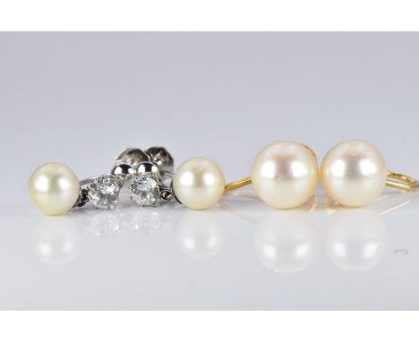 A pair of 9ct white gold Ciro earrings set with cubic zirconia and cultured pearls and a pair of 9ct gold earrings set with p
