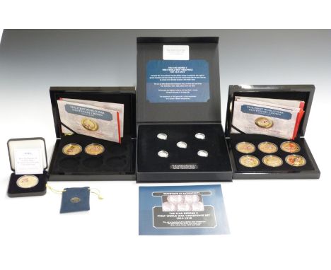 Nine Bradford Exchange WW1 commemorative gold plated coins with colour enhancement, housed in three cases, together with a Ki