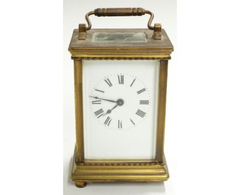 Brass carriage clock with Roman enamelled dial, corniche corners to case and movement stamped 'Made in France', H12cm