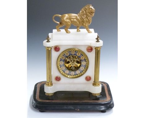 French 19thC&nbsp;mantel clock in onyx case supported by gilt brass reeded columns, surmounted by standing lion, the dial wit