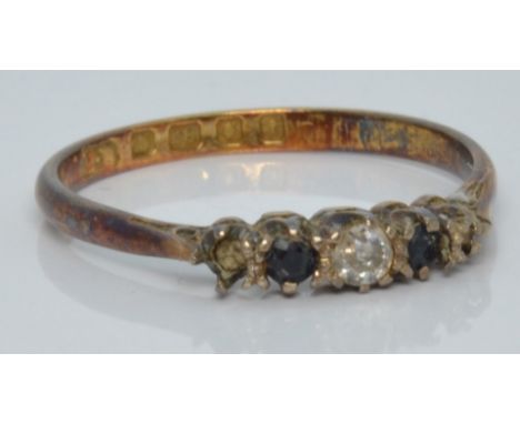 An 18ct gold ring set with a diamond and two sapphires, London 1864, 1.5g, size L/M&nbsp;