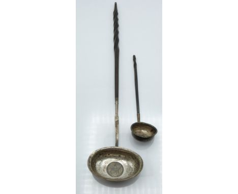 George III silver coin based toddy ladle together with a similar smaller ladle, length of longer 38.5cm