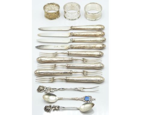 Cake knives and forks with hallmarked silver handles, continental white metal spoon and fork with floral finial, stamped 835,