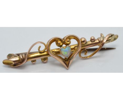 Edwardian 9ct gold brooch set with a heart cut opal cabochon in original Skinner, London box, 1 x 4cm, 2.5g