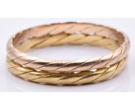 An 18ct gold bi-coloured rope twist ring, 2.2g, size K