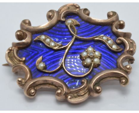 Victorian mourning brooch set with blue guilloché enamel, seed pearls and a diamond, verso a glass compartment, 3.5 x 3cm, 12