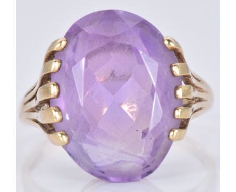 A 9ct gold ring set with an oval cut amethyst, 4.0g, size N